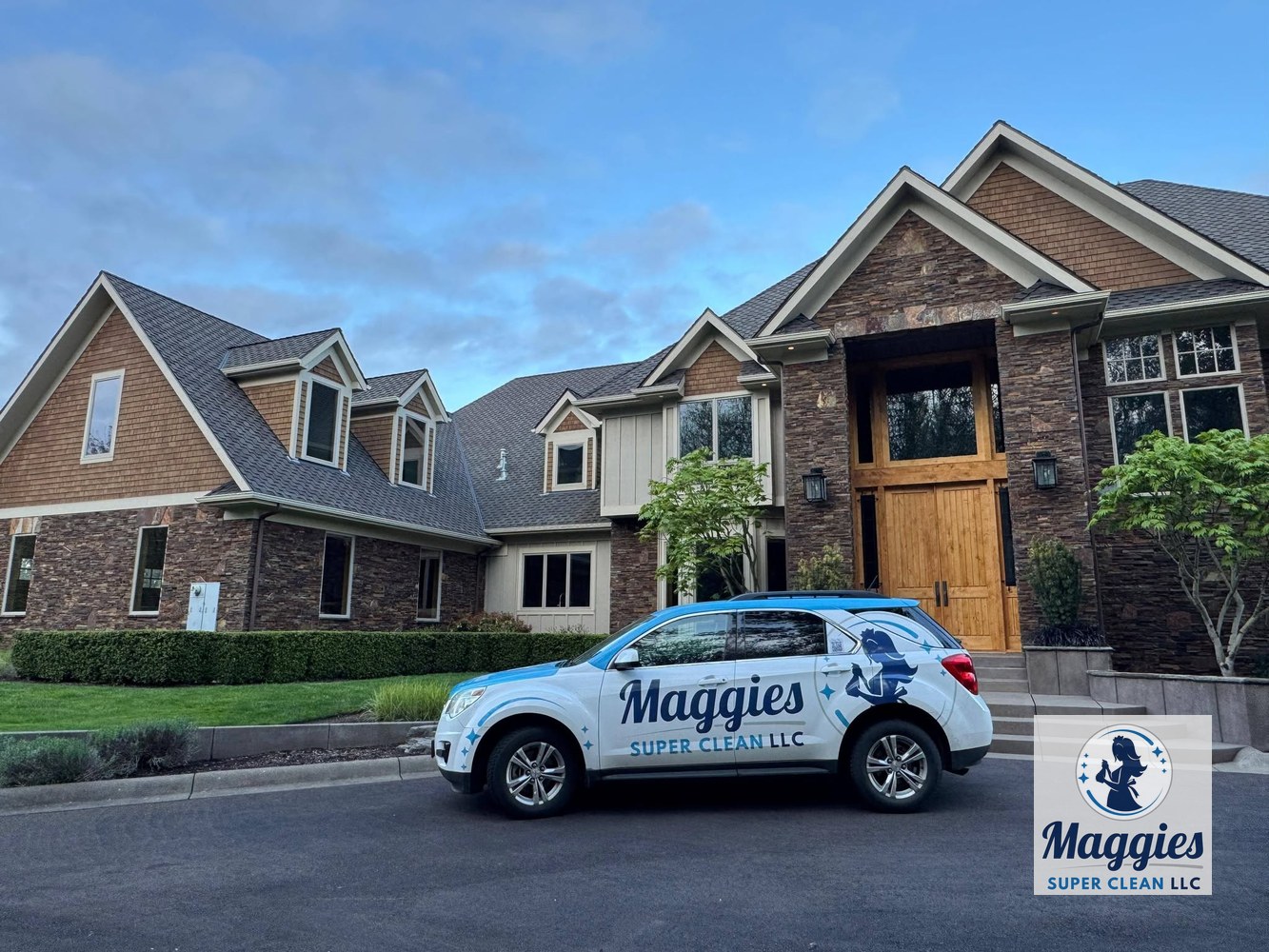 Maggie&rsquo;s Super Clean vehicle parked outside the large residential property served during the cleaning project.