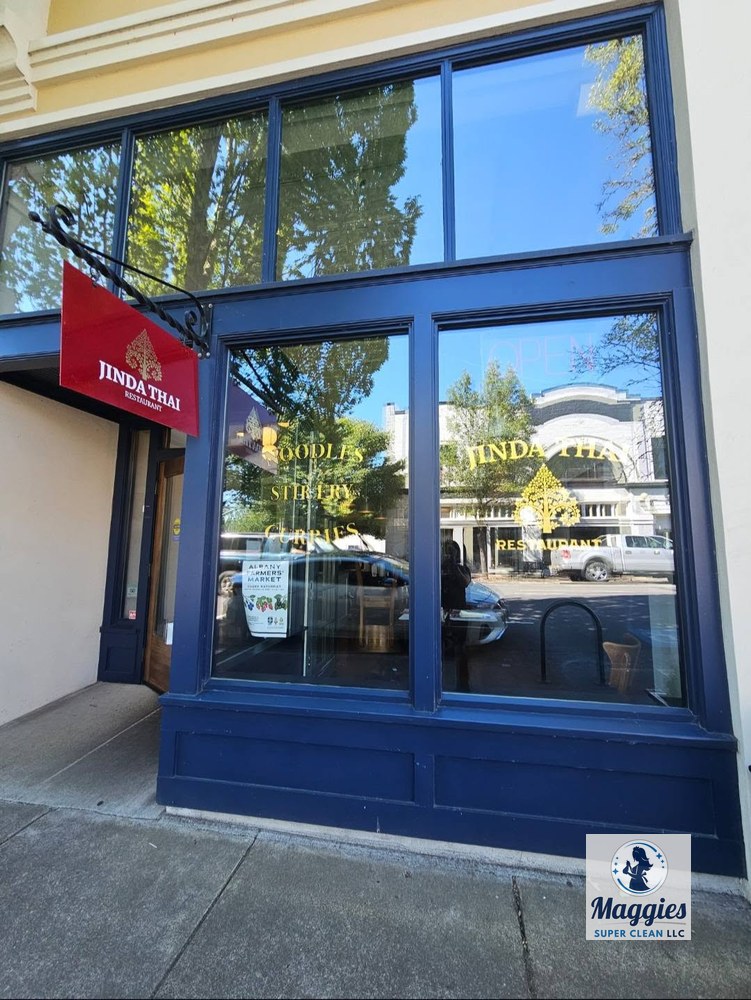 Jinda Thai Restaurant&rsquo;s storefront with clean glass entry doors and windows, clearly displaying the restaurant&rsquo;s exterior signage.